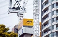 Mirvac logos on corporate building and crane