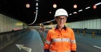 Image of woman in Transurban uniform talking about digital capabilities